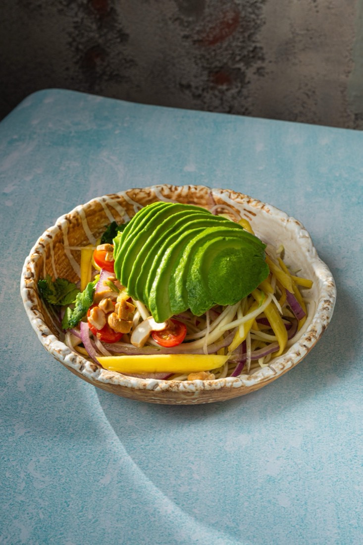 Mango avocado papaya salad with chili lime dressing